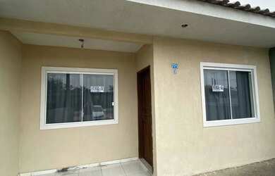 Imagem: A casa possui 2 Dormitórios, 2 Banheiros, 1 Vaga na garagem