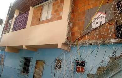 Imagem: A casa possui 4 Dormitórios, 3 Banheiros, 3m² de Área e