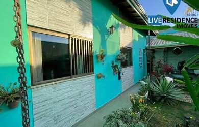 Imagem: A casa possui 3 Dormitórios, 2 Banheiros, 3 Vagas na garagem