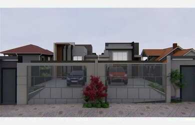 Imagem: A casa possui 3 Dormitórios, 2 Banheiros, 2 Vagas na garagem