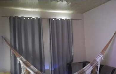 Imagem: A casa possui 2 Dormitórios, 2 Banheiros, 2 Vagas na garagem