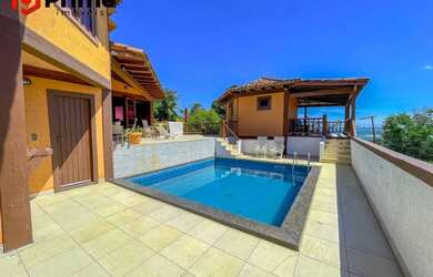 Imagem: A casa possui 5 Dormitórios, 5 Banheiros, 4 Vagas na garagem