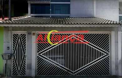 Imagem: A casa possui 3 Dormitórios, 2 Banheiros, 2 Vagas na garagem