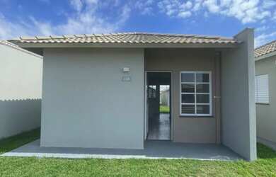 Imagem: A casa em condomínio possui 2 Dormitórios, 1 Banheiro, 2 Vagas