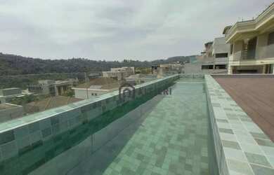 Imagem: A casa em condomínio possui 4 Dormitórios, 5 Banheiros, 4