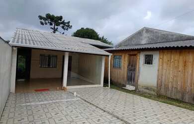 Imagem: A casa possui 2 Dormitórios, 2 Banheiros, 1 Vaga na garagem