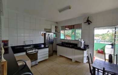 Imagem: A casa possui 4 Dormitórios, 4 Banheiros, 3 Vagas na garagem