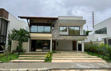 Imagem: A casa possui 5 Dormitórios, 5 Banheiros, 4 Vagas na garagem