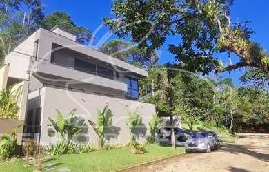 Imagem: A casa em condomínio à venda possui 4 Dormitórios, 5 Banheiros