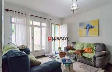 Imagem: A casa possui 3 Dormitórios, 2 Banheiros, 5 Vagas na garagem