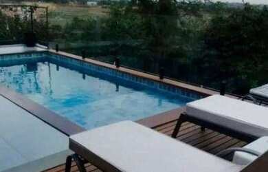 Imagem: A casa em condomínio possui 4 Dormitórios, 5 Banheiros, 4