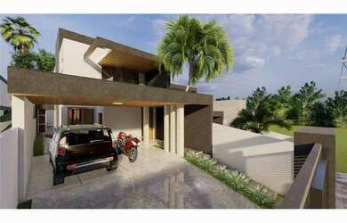 Imagem: A casa possui 3 Dormitórios, 2 Banheiros, 4 Vagas na garagem