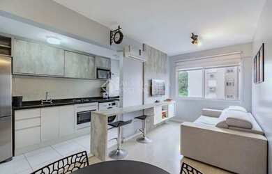 Imagem: O apartamento possui 2 Dormitórios, 1 Banheiro, 1 Vaga na garagem