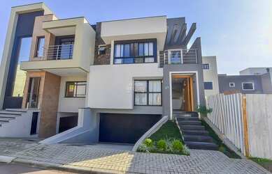 Imagem: A casa em condomínio possui 3 Dormitórios, 3 Banheiros, 3