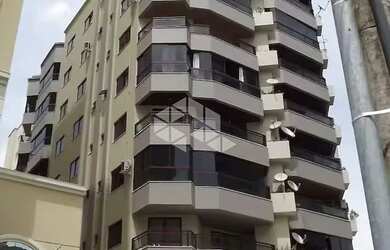 Imagem: O apartamento possui 3 Dormitórios, 1 Banheiro, 1 Vaga na garagem