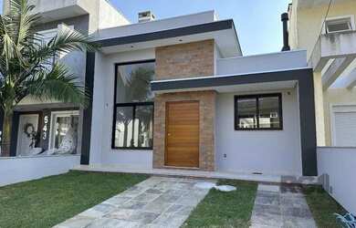 Imagem: A casa possui 3 Dormitórios, 2 Banheiros, 2 Vagas na garagem