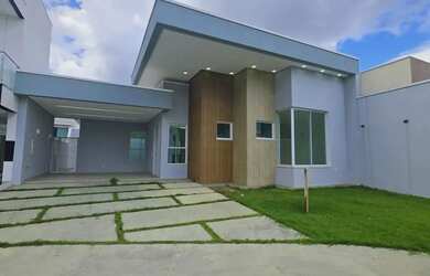 Imagem: A casa possui 3 Dormitórios, 4 Banheiros, 3 Vagas na garagem