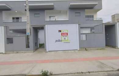 Imagem: A casa possui 2 Dormitórios, 3 Banheiros, 1 Vaga na garagem