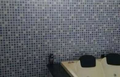 Imagem: A casa possui 3 Dormitórios, 3 Banheiros e 3 Vagas na garagem