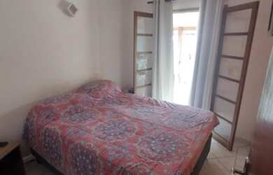 Imagem: A casa possui 3 Dormitórios, 2 Banheiros, 3 Vagas na garagem