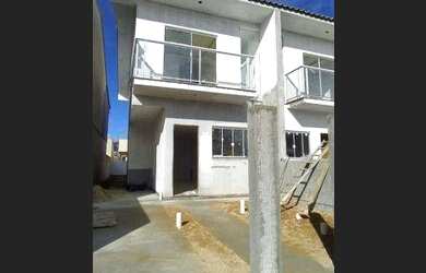 Imagem: A casa possui 3 Dormitórios, 3 Banheiros, 2 Vagas na garagem