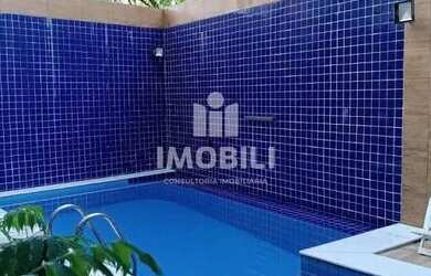 Imagem: A casa possui 4 Dormitórios, 5 Banheiros, 1 Vaga na garagem