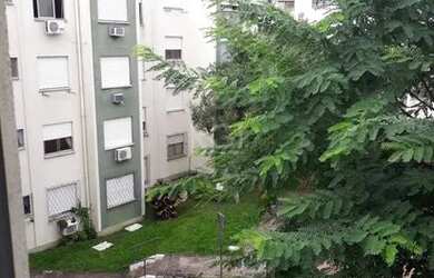 Imagem: O apartamento possui 3 Dormitórios, 1 Banheiro, 1 Vaga na garagem