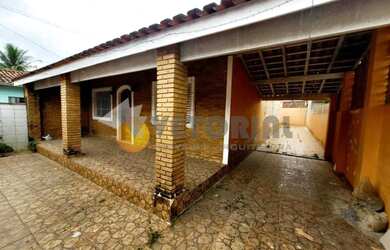 Imagem: A casa possui 3 Dormitórios, 2 Banheiros, 3 Vagas na garagem