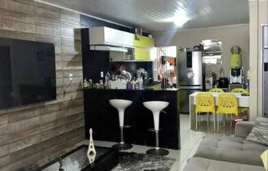 Imagem: A casa possui 3 Dormitórios, 2 Banheiros, 1 Vaga na garagem