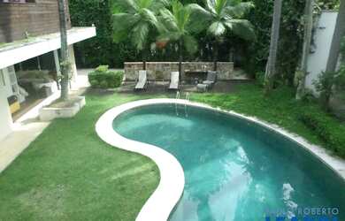 Imagem: A casa à venda possui 4 Dormitórios, 5 Banheiros, 4 Vagas