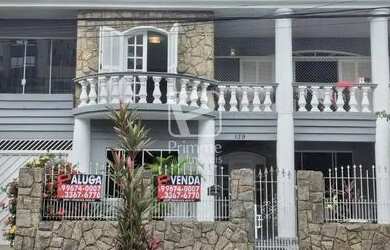 Imagem: A casa possui 5 Dormitórios, 3 Banheiros, 3 Vagas na garagem