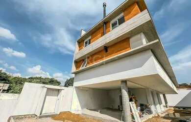 Imagem: A casa em condomínio possui 3 Dormitórios, 3 Banheiros, 2