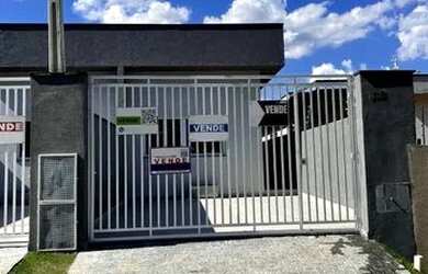 Imagem: A casa possui 3 Dormitórios, 3 Banheiros, 2 Vagas na garagem