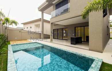 Imagem: A casa em condomínio possui 4 Dormitórios, 5 Banheiros, 4