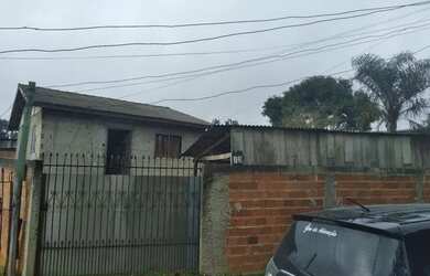 Imagem: A casa à venda possui 3 Dormitórios e 1 Banheiro e está localizado