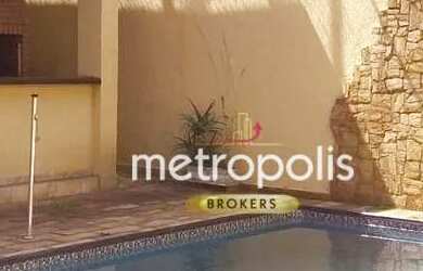 Imagem: A casa possui 5 Dormitórios, 5 Banheiros, 4 Vagas na garagem