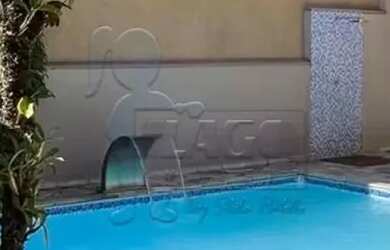 Imagem: A casa possui 5 Dormitórios, 5 Banheiros, 5 Vagas na garagem