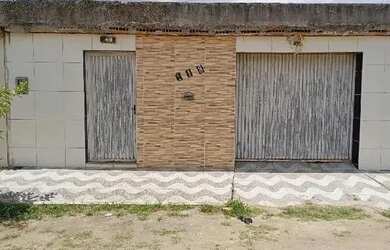 Imagem: A casa possui 2 Dormitórios, 1 Banheiro, 1 Vaga na garagem