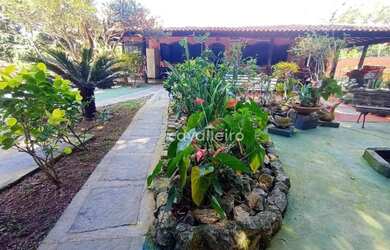 Imagem: A casa possui 3 Dormitórios, 4 Banheiros, 4 Vagas na garagem