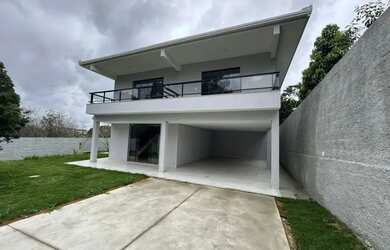 Imagem: A casa possui 3 Dormitórios, 4 Banheiros, 4 Vagas na garagem