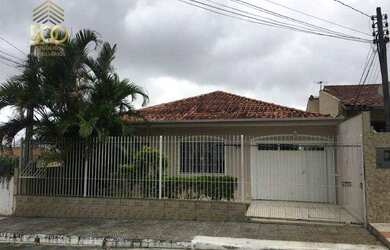 Imagem: A casa possui 3 Dormitórios, 2 Banheiros, 2 Vagas na garagem