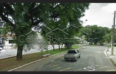 Imagem: A casa possui 4 Dormitórios, 3 Banheiros, 5 Vagas na garagem