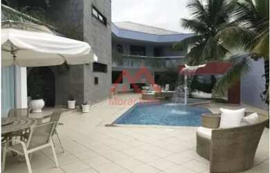 Imagem: A casa em condomínio possui 4 Dormitórios, 5 Banheiros, 4