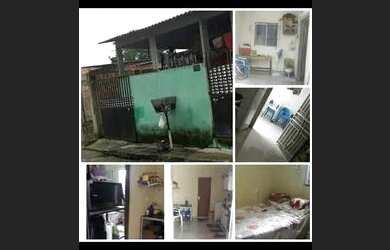 Imagem: A casa possui 4 Dormitórios, 2 Banheiros, 1 Vaga na garagem