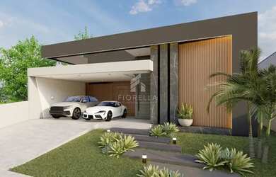 Imagem: A casa possui 3 Dormitórios, 2 Banheiros, 4 Vagas na garagem