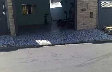 Imagem: A casa possui 2 Dormitórios, 3 Banheiros, 2 Vagas na garagem