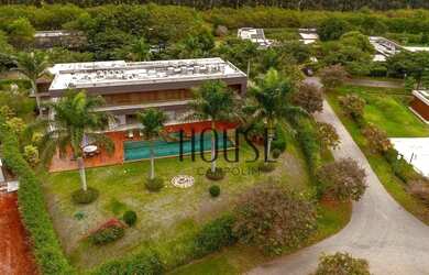 Imagem: A casa em condomínio possui 5 Dormitórios, 5 Banheiros, 5