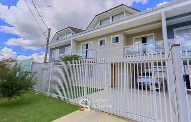 Imagem: A casa possui 3 Dormitórios, 4 Banheiros, 3 Vagas na garagem