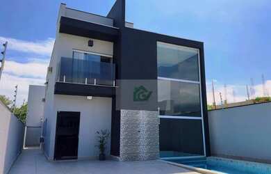 Imagem: A casa possui 4 Dormitórios, 5 Banheiros, 4 Vagas na garagem