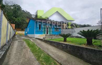 Imagem: A casa possui 3 Dormitórios, 1 Banheiro, 3 Vagas na garagem